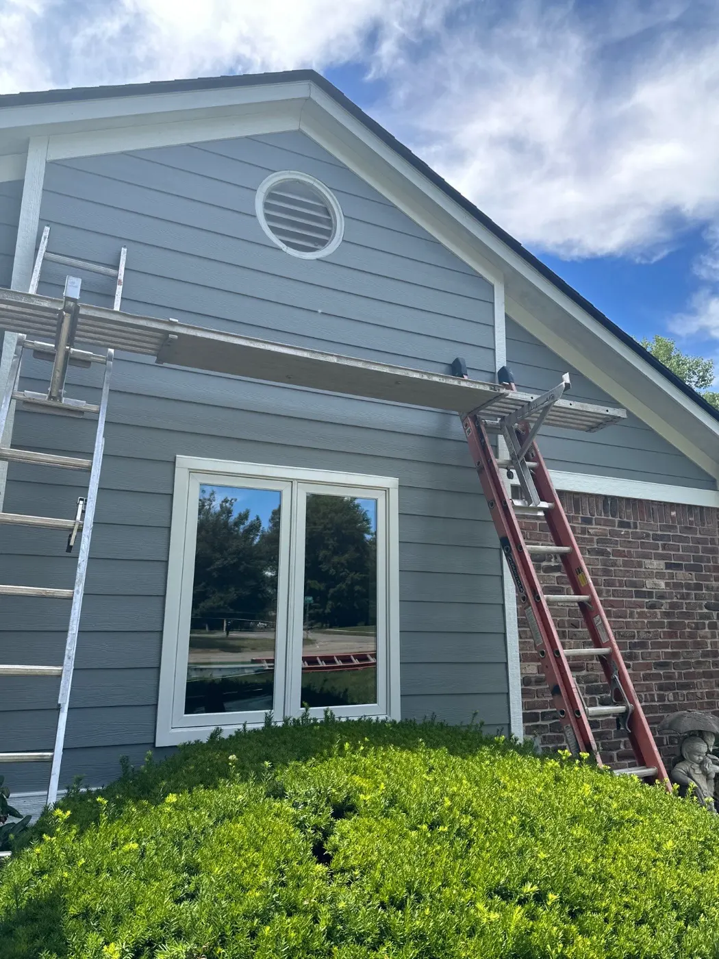 Storm-damaged siding documented in Geist Overlook
