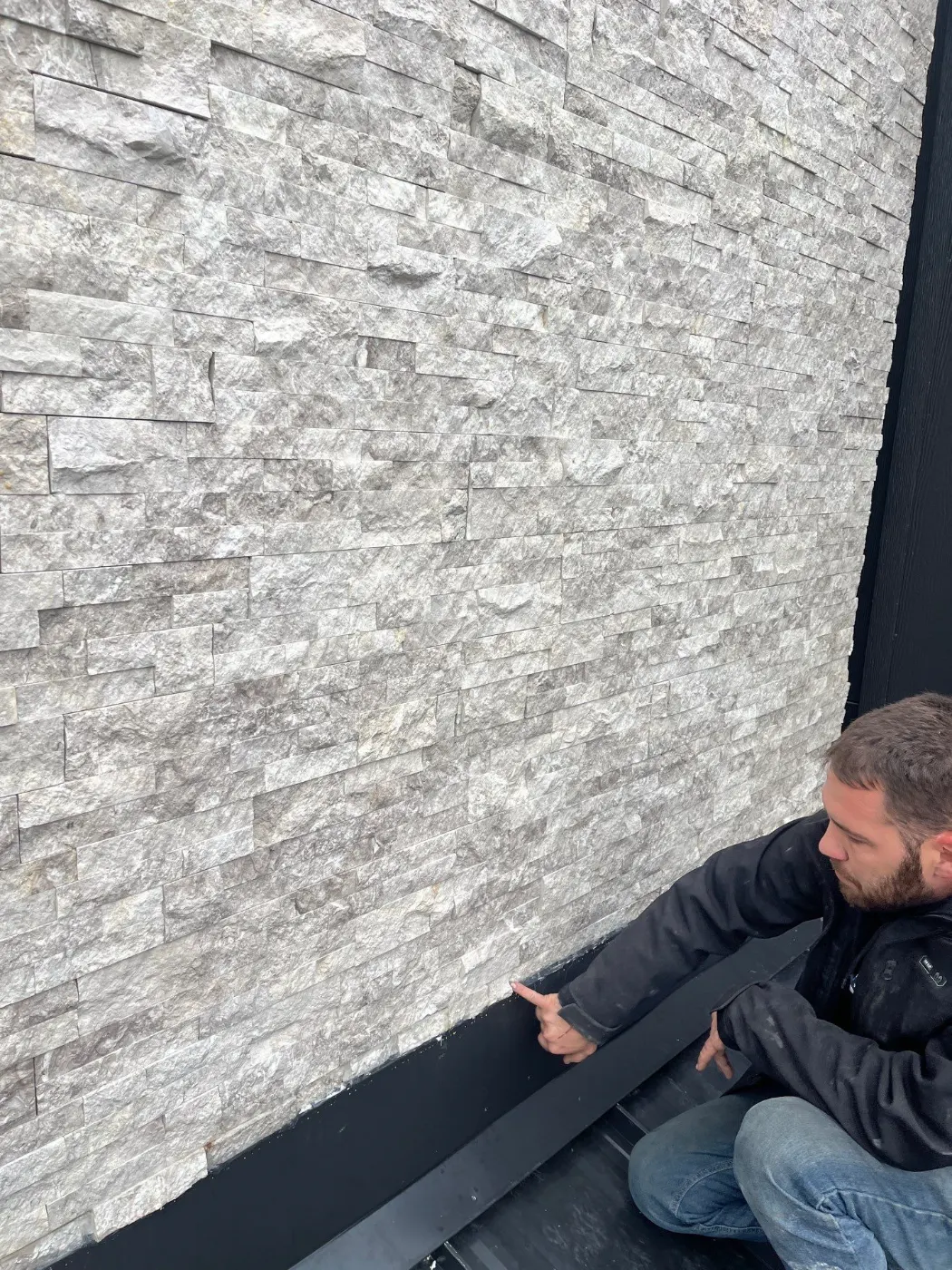 Siding installation documented in Geist Overlook
